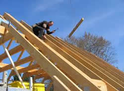 Installing trusses for roofing project Installing trusses for roofing project